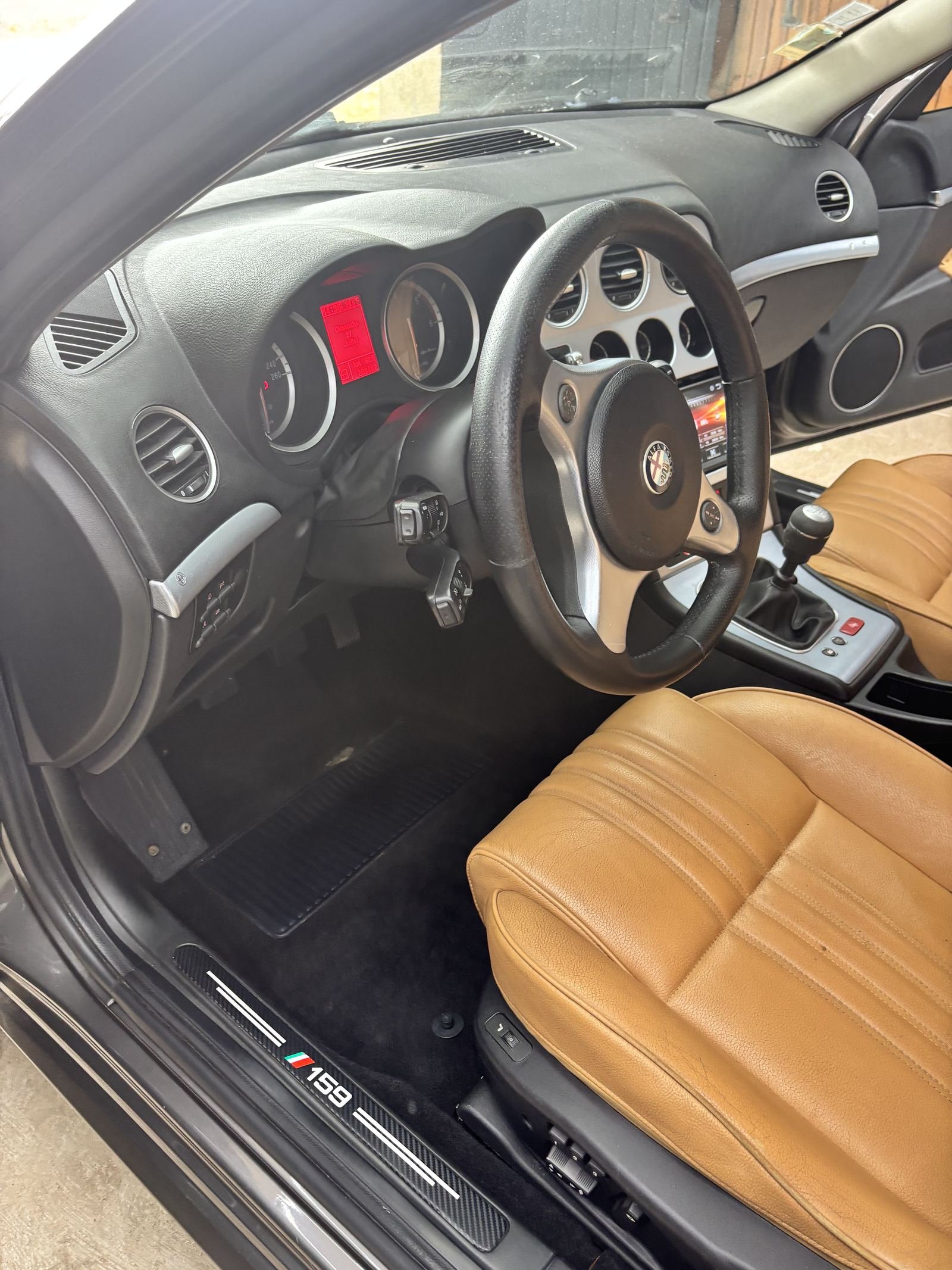 Habitacle Alfa Romeo 159 après nettoyage intérieur premium
